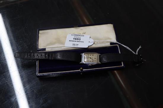 A gentlemans 1930s silver manual wind wrist watch, retailed by J.W. Benson, on leather strap in Benson box.